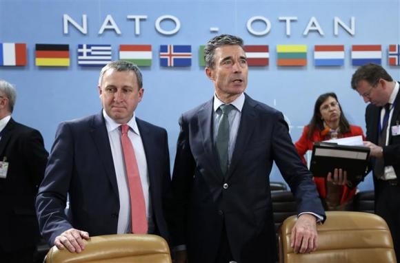 ukrainian foreign minister andriy deshchytsia and nato secretary general anders fogh rasmussen r attend a nato ukraine foreign ministers meeting at the alliance headquarters in brussels april 1 2014 nato sees no sign that russia is withdrawing troops from the ukraine border and will look at all options to boost the alliance 039 s defences its secretary general said on tuesday photo reuters