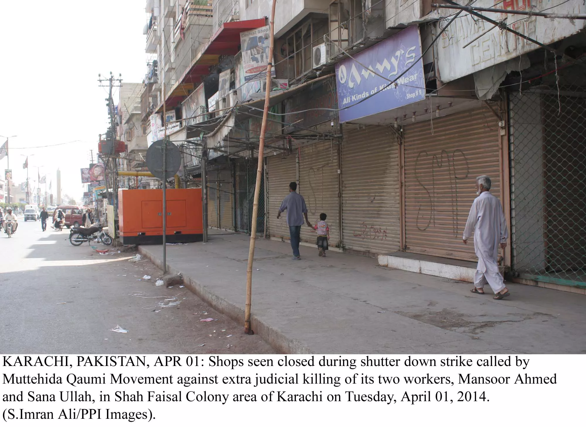 residents walk past closed shops in shah faisal colony area of karachi after the mqm called for a strike photo ppi residents walk past closed shops in shah faisal colony area of karachi after the mqm called for a strike photo ppi