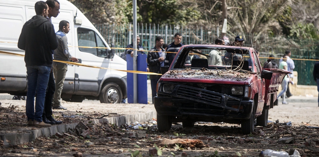 damage after twin bombs struck police posts near cairo university photo afp