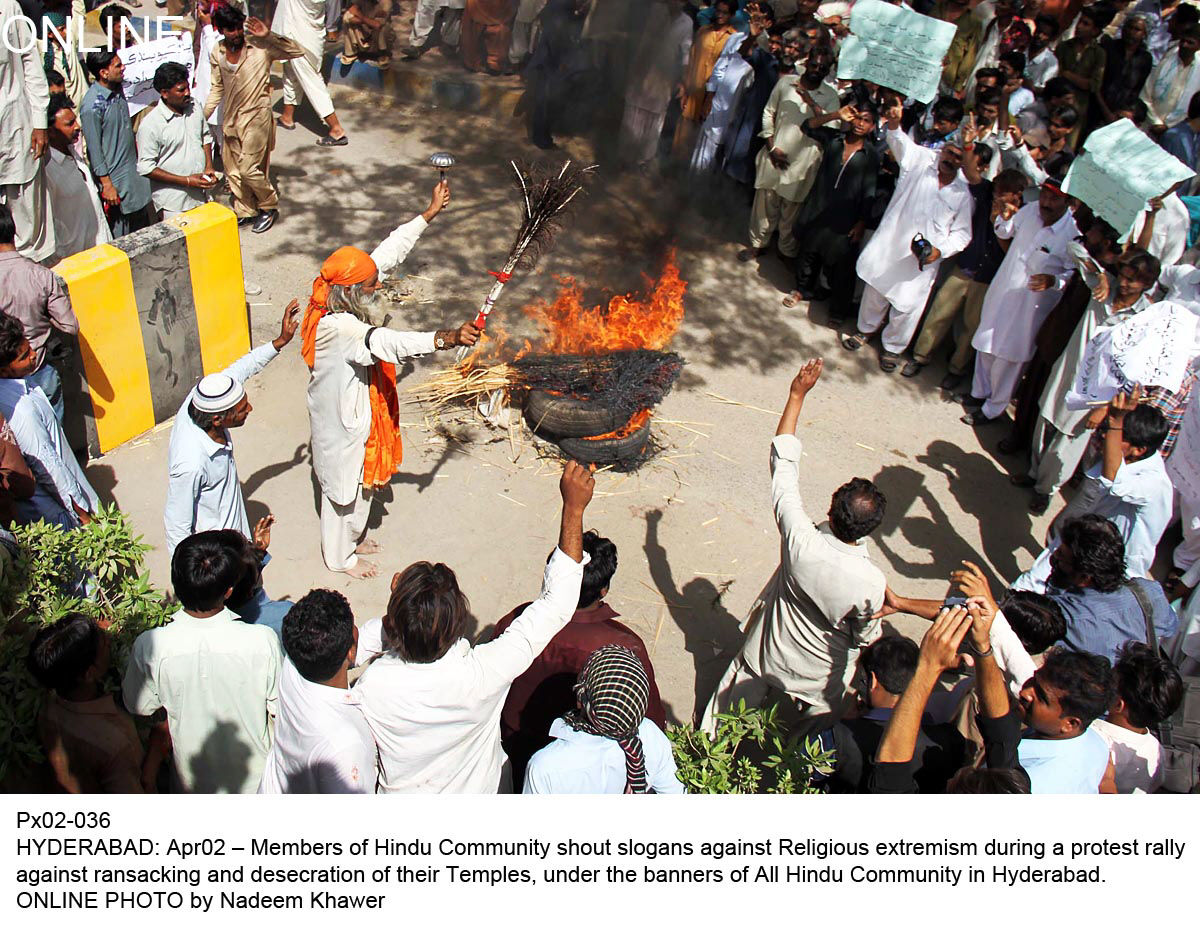 members of the hindu community burn tyres as they stage a protests against the vandalism of their temples in hyderabad photo online