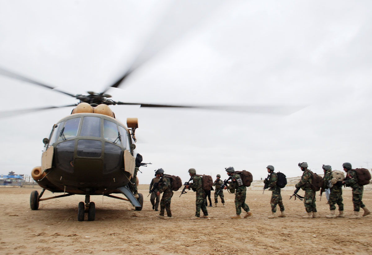 afghan national army ana soldiers board a russian origin helicopter nato russian cooperation through the helicopter maintenance trust fund would also be halted photo reuters