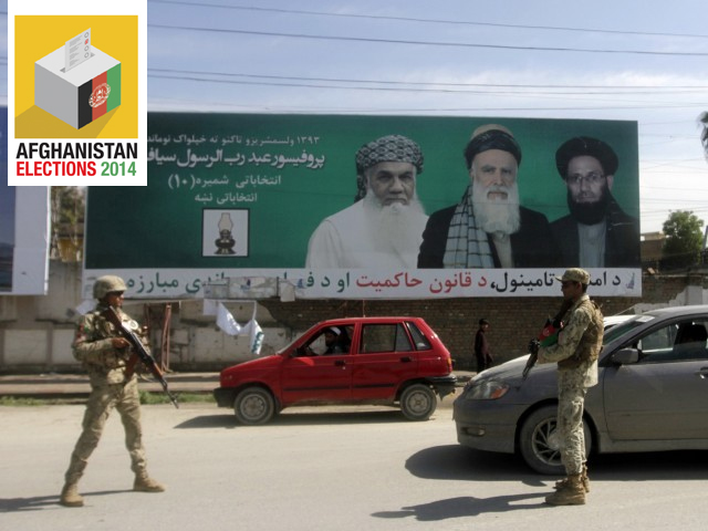 afghan police officers patrol a checkpoint as part of increased security measures ahead of the country 039 s election in jalalabad on april 3 photo reuters