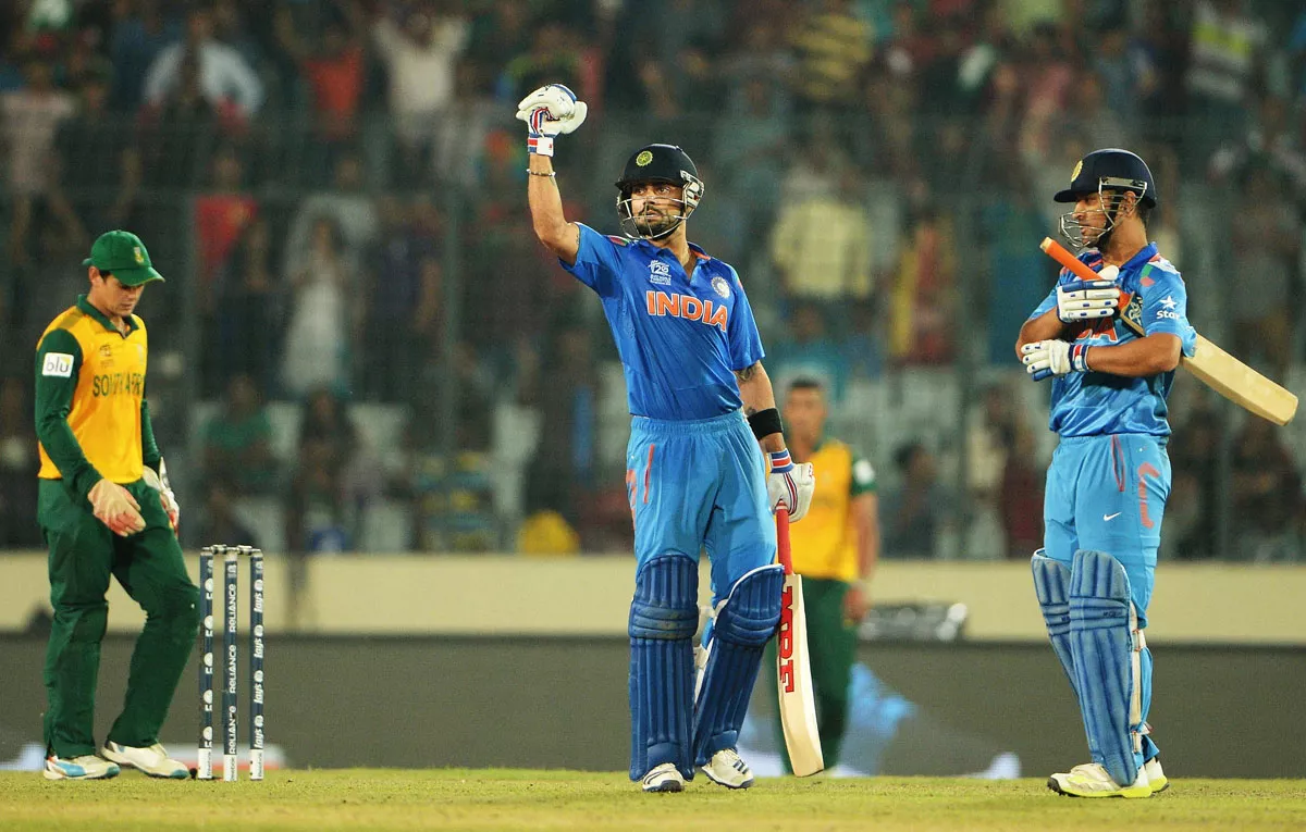 india captain mahendra singh dhoni r and batsman virat kohli c celebrate after india won the icc world twenty20 cricket tournament second semi final match against south africa at the sher e bangla national cricket stadium in dhaka on april 4 2014 photo afp india captain mahendra singh dhoni r and batsman virat kohli c celebrate after india won the icc world twenty20 cricket tournament second semi final match against south africa at the sher e bangla national cricket stadium in dhaka on april 4 2014 photo afp