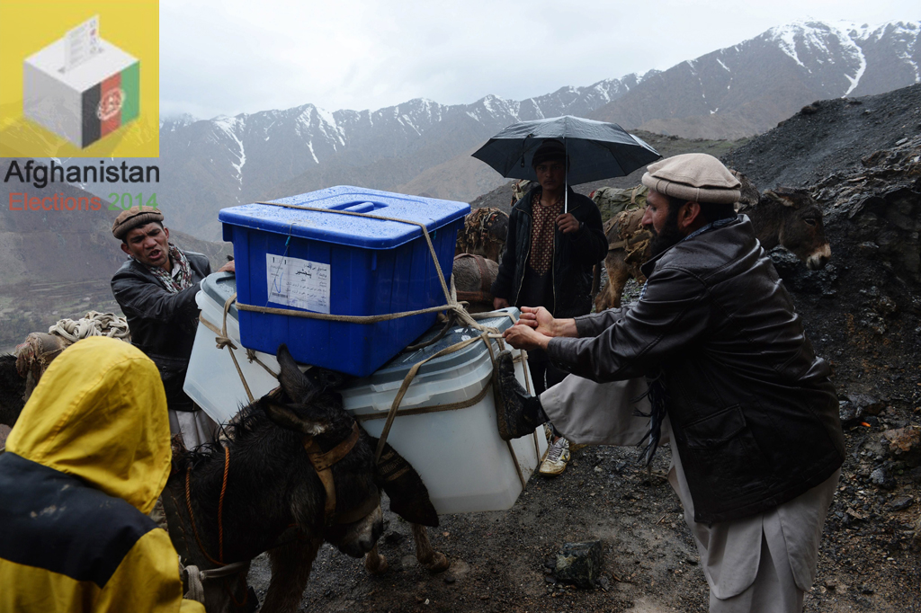 afghan villagers strap election materials to donkeys as they head back to their village along a country road high in the mountains of shutul district in northern afghanistan on april 4 2014 photo afp