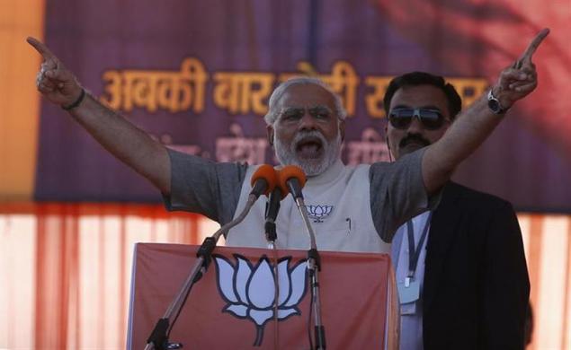 narendra modi prime ministerial candidate for the main opposition bharatiya janata party bjp gestures as he address a rally on the outskirts of new delhi april 3 2014 photo reuters file