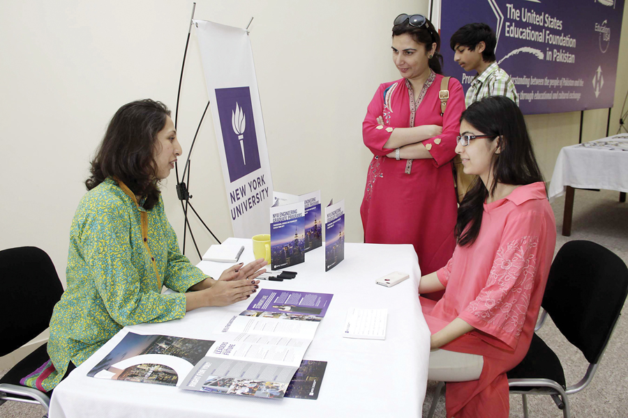 fatema dalal of the nyu talking to prospective students at the fair on sunday photo shafiq malik express