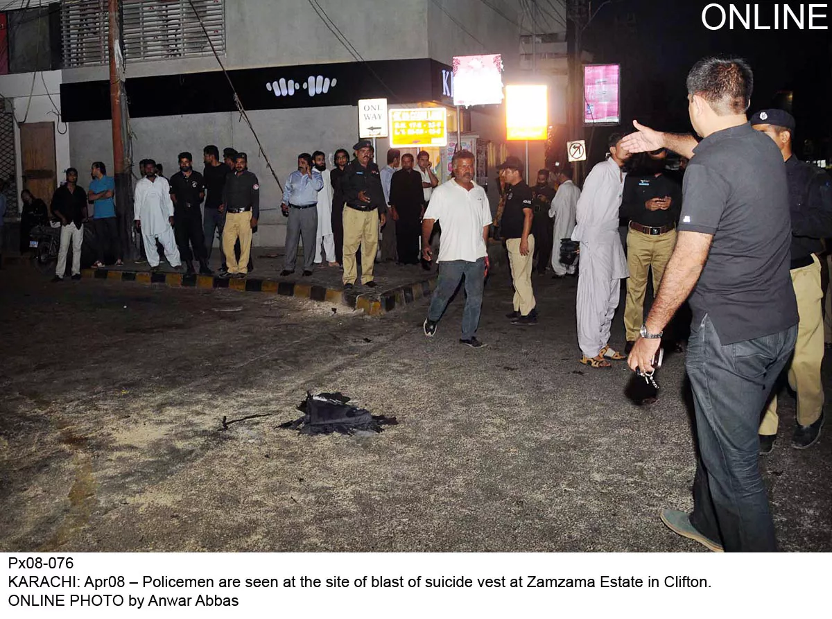 officials gather at the scene of a blast in zamzama commercial area on tuesday evening photo online officials gather at the scene of a blast in zamzama commercial area on tuesday evening photo online