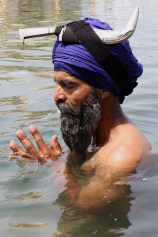 file photo of an indian sikh devotee paying his respects during the baisakhi festival at the sikh shrine golden temple in amritsar photo afp file photo of an indian sikh devotee paying his respects during the baisakhi festival at the sikh shrine golden temple in amritsar photo afp