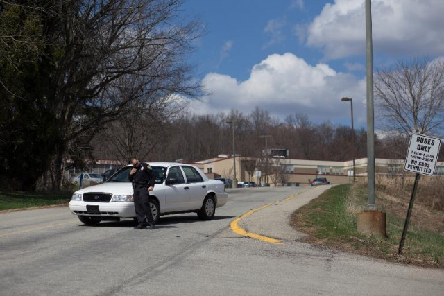 a murrysville police officer blocks a road at the scene of a mass stabbing at franklin regional senior high school april 9 2014 in murrysville pennsylvania photo afp a murrysville police officer blocks a road at the scene of a mass stabbing at franklin regional senior high school april 9 2014 in murrysville pennsylvania photo afp