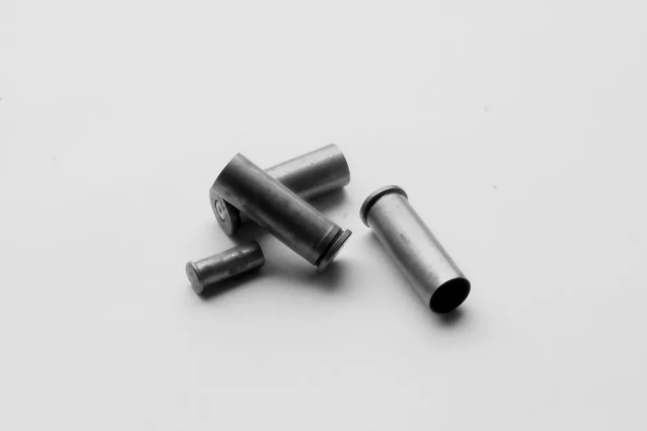 empty shells found from the scenes of both crimes were from the same 9mm pistol the report states photo file empty shells found from the scenes of both crimes were from the same 9mm pistol the report states photo file