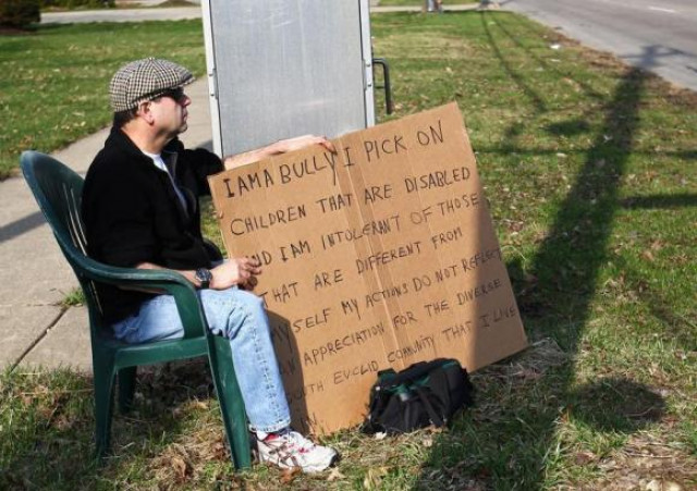 edmond aviv 62 sits with a sign he made at a street corner in the cleveland suburb of south euclid ohio april 13 2014 photo reuters edmond aviv 62 sits with a sign he made at a street corner in the cleveland suburb of south euclid ohio april 13 2014 photo reuters