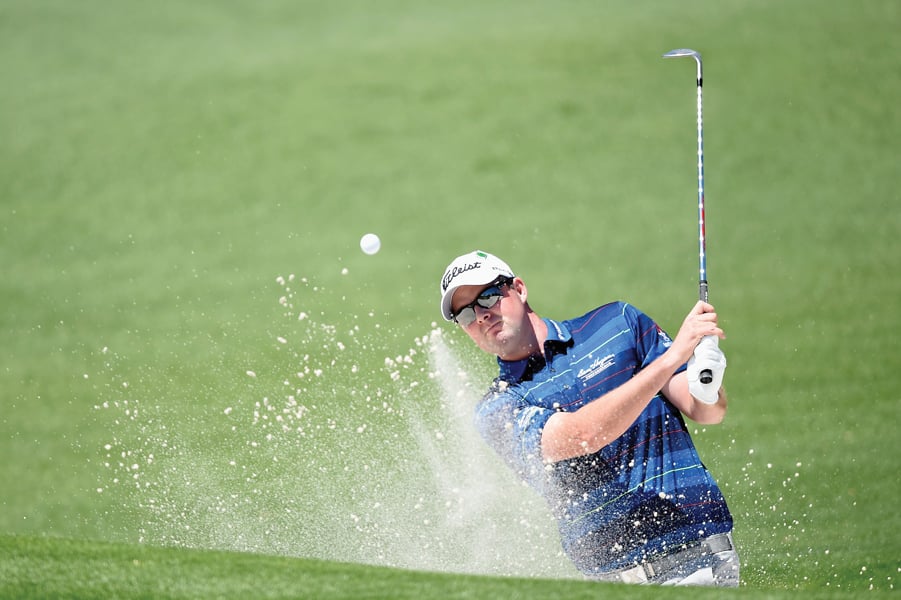 australia s underdog marc leishman will look to hold on to his lead as favourites are looking to pounce photo afp