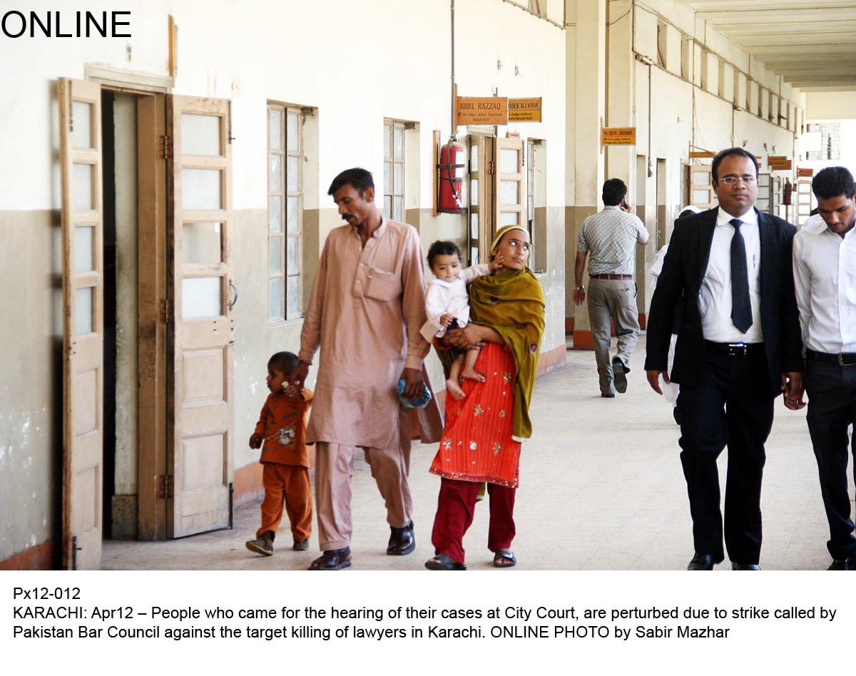 people walk past empty court rooms at the city court after lawyers extended their boycott to protest the killings of their colleagues photo online