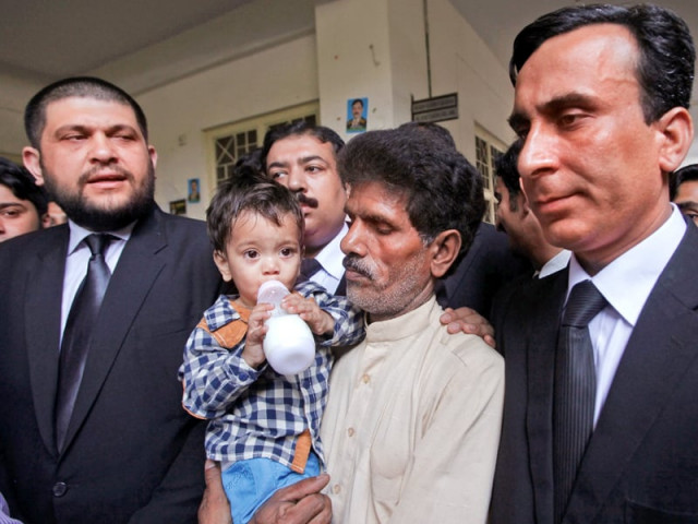nine month old musa khan carried by his grandfather as they leave the court in lahore photo reuters nine month old musa khan carried by his grandfather as they leave the court in lahore photo reuters