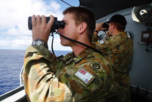 malaysia says no mid flight phone call from mh370 cockpit photo afp