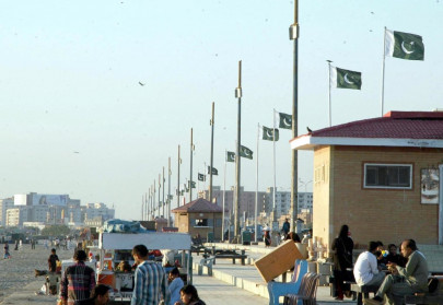 a helping hand volunteers clean beach and plant trees