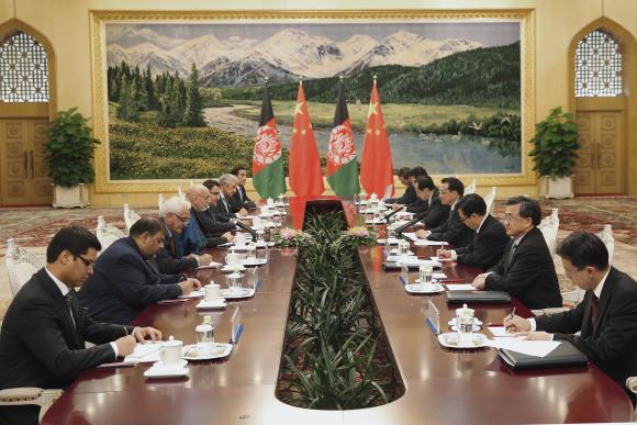 afghanistan 039 s president hamid karzai center l meets with china 039 s premier li keqiang center r at the great hall of the people in beijing september 27 2013 photo reuters file