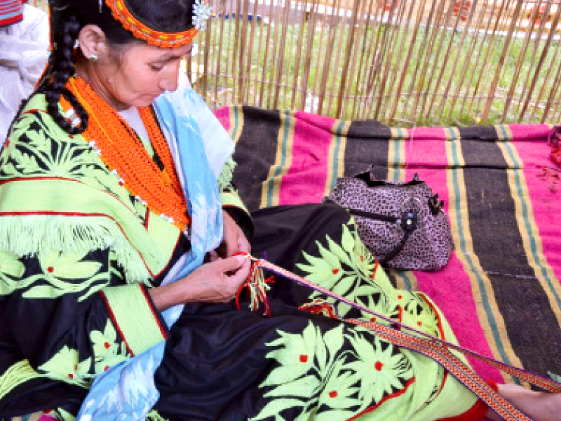 woman artisan works on a kalash costume photo myra iqbal express