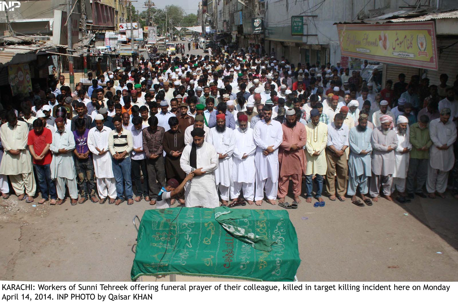 workers of sunni tehreek offer funeral prayers for their colleague photo inp