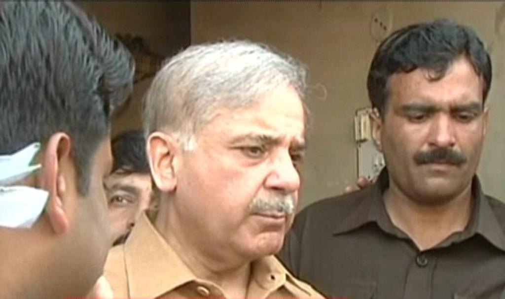 express news screengrab of punjab chief minister shahbaz sharif talking to the media outside the house of the family of the gang rape victim