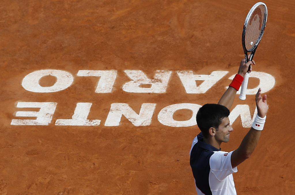 serbia 039 s novak djokovic celebrates after beating spain 039 s albert montanes during a monte carlo atp masters series tournament tennis match on april 15 2014 in monaco photo afp