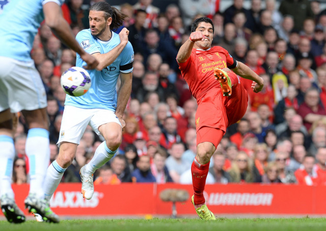 liverpool s 3 2 victory at anfield on sunday allowed the reds to stay clear at the top of the table and extend their advantage over third placed city to seven points photo afp liverpool s 3 2 victory at anfield on sunday allowed the reds to stay clear at the top of the table and extend their advantage over third placed city to seven points photo afp