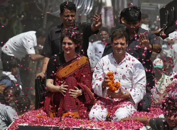 rahul gandhi in white and his sister priyanka gandhi vadra are showered with rose petals by their supporters upon rahul 039 s arrival to file his nomination for the general election at amethi in uttar pradesh april 12 2014 photo reuters rahul gandhi in white and his sister priyanka gandhi vadra are showered with rose petals by their supporters upon rahul 039 s arrival to file his nomination for the general election at amethi in uttar pradesh april 12 2014 photo reuters