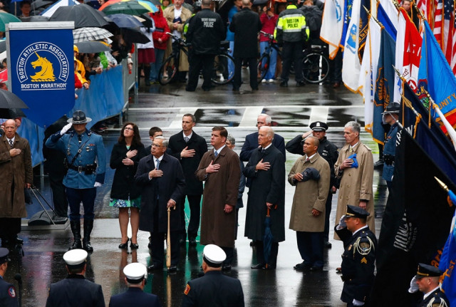 boston ma april 15 l r former boston mayor thomas menino boston mayor marty walsh u s vice president joe biden massachusetts governor deval patrick and tom grilk executive director boston athletic association stand together during 039 god bless america 039 at the flag raising ceremony commemorating the one year anniversary of the boston marathon bombings on boylston street near the finish line on april 15 2014 in boston massachusetts last year two pressure cooker bombs killed three and injured an estimated 264 others during the boston marathon on april 15 2013 photo afp boston ma april 15 l r former boston mayor thomas menino boston mayor marty walsh u s vice president joe biden massachusetts governor deval patrick and tom grilk executive director boston athletic association stand together during 039 god bless america 039 at the flag raising ceremony commemorating the one year anniversary of the boston marathon bombings on boylston street near the finish line on april 15 2014 in boston massachusetts last year two pressure cooker bombs killed three and injured an estimated 264 others during the boston marathon on april 15 2013 photo afp