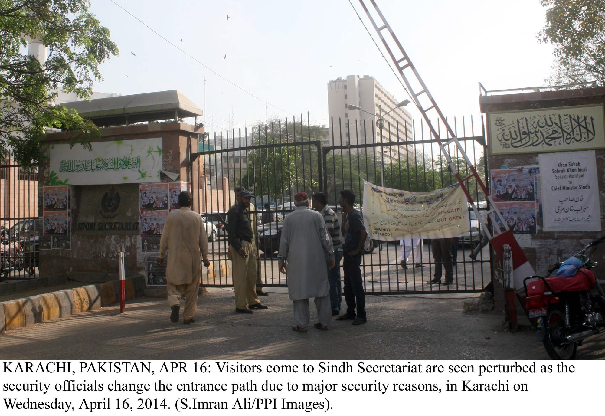police and security officials stop people from entering the sindh secretariat after it was closed for public on wednesday photo ppi