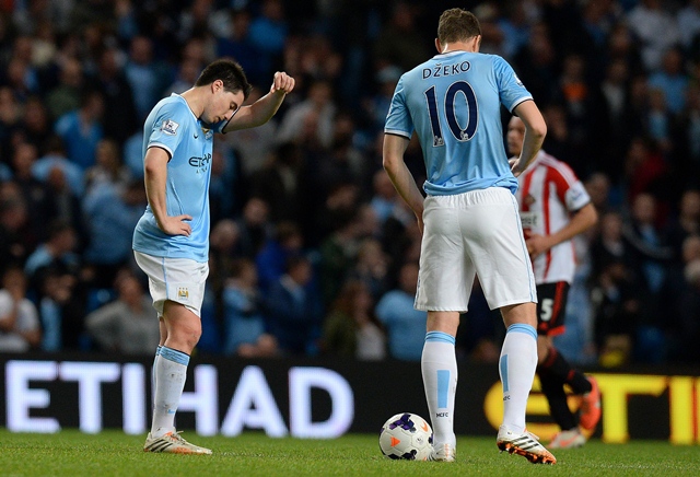 manchester city suffer a major setback in their bid for the premier league against bottom of the table sunderland as they were held to a 2 2 draw at the etihad