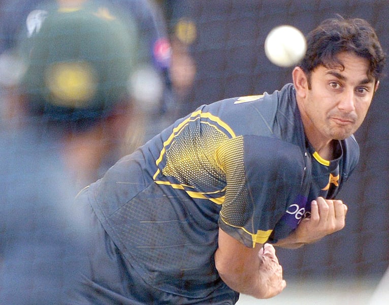 saeed ajmal will travel to england to play for worcestershire in unfriendly spin conditions to prepare for the 50 over 2015 world cup in australia that has similar pitches photo afp