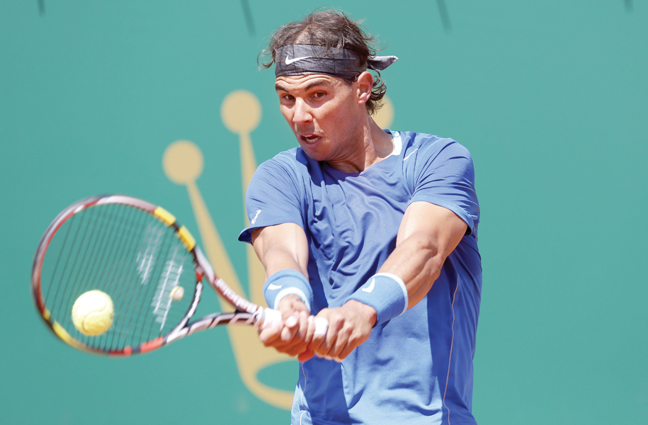 nadal became the 11th player to register his 300th win on clay after beating italian adreas seppi photo afp