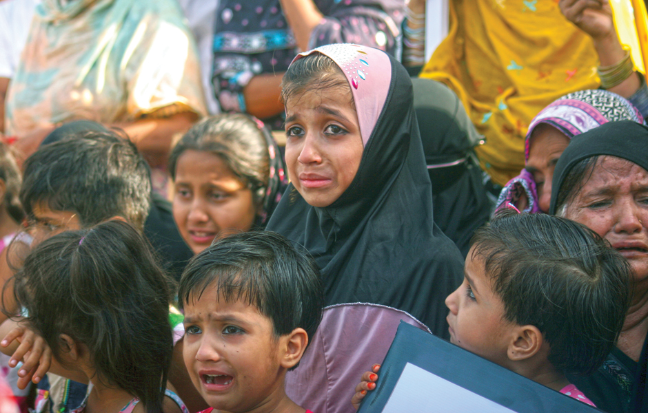 protestors gathered outside the press club holding photographs of their loved ones who had gone missing photo athar khan express