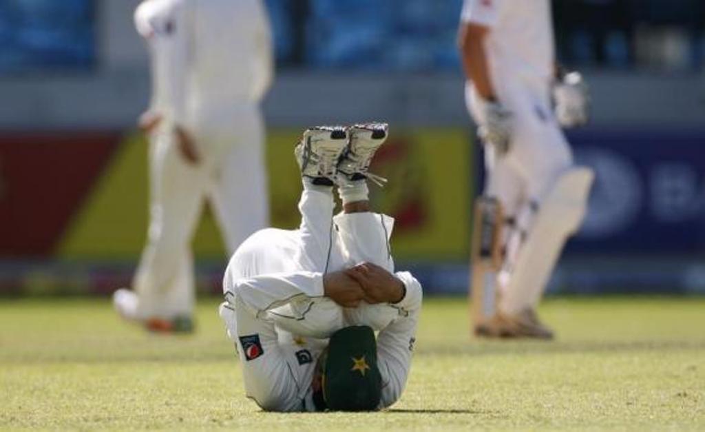 saeed ajmal stretches during the first cricket test match against england at the dubai international cricket stadium in the united arab emirates january 19 2012 photo reuters