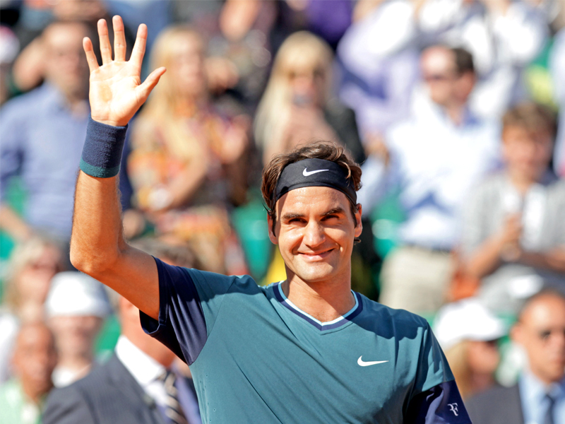 rodger federer cruised past novak djokovic 7 5 6 2 to reach the final of the monte carlo masters where he will face fellow countryman stanislas wawrinka photo afp