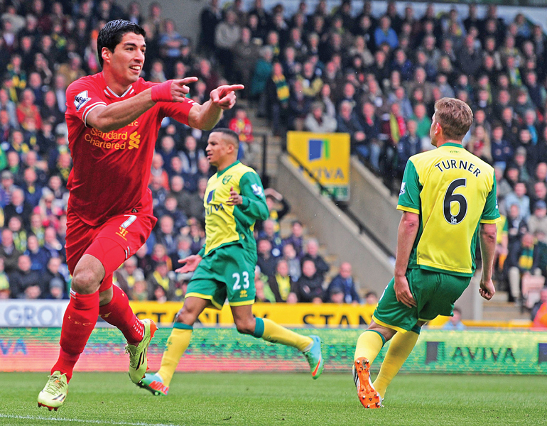 liverpool are on the brink of a premier league title after 20 years as they defeated norwich 3 2 on sunday photo afp