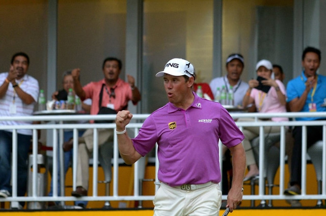 lee westwood of england celebrates on the 18th hole after winning the maybank malaysian open golf tournament in kuala lumpur on april 20 2014 photo afp lee westwood of england celebrates on the 18th hole after winning the maybank malaysian open golf tournament in kuala lumpur on april 20 2014 photo afp