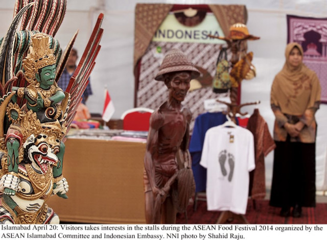 statues and artefacts on display left while visitors take interest in the south east asian cuisines during the asean food festival photos nni waqas naeem statues and artefacts on display left while visitors take interest in the south east asian cuisines during the asean food festival photos nni waqas naeem