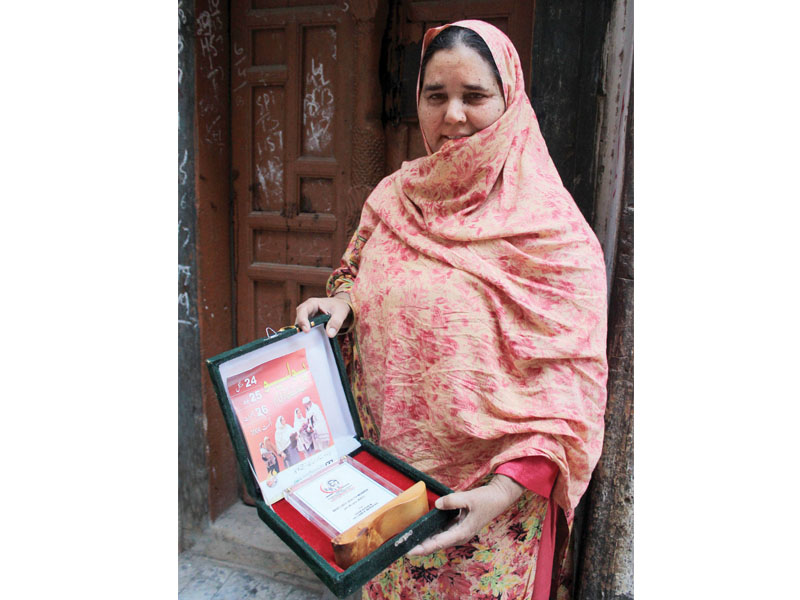 this lady health worker a widow has potentially safeguarded the lives of a thousand children through anti polio inoculations photo muhammad iqbal express