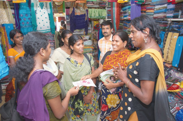 bharathi kannamma a transgender hailing from the madurai district in southern tamil nadu state talks to women in a shop while campaigning afp bharathi kannamma a transgender hailing from the madurai district in southern tamil nadu state talks to women in a shop while campaigning afp