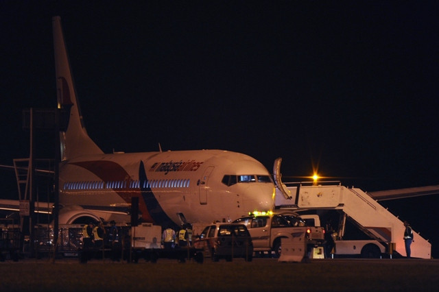 a malaysia airlines boeing 737 800 flight mh192 is seen on the tarmac after an emergency landing at the kuala lumpur international airport photo afp a malaysia airlines boeing 737 800 flight mh192 is seen on the tarmac after an emergency landing at the kuala lumpur international airport photo afp