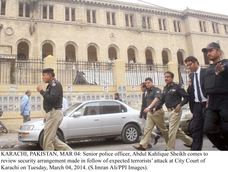 police officials survey the city court premises on march 4 to check the security arrangements in light of potential attacks the security measures decided by the stakeholders are yet to be put in place photo file