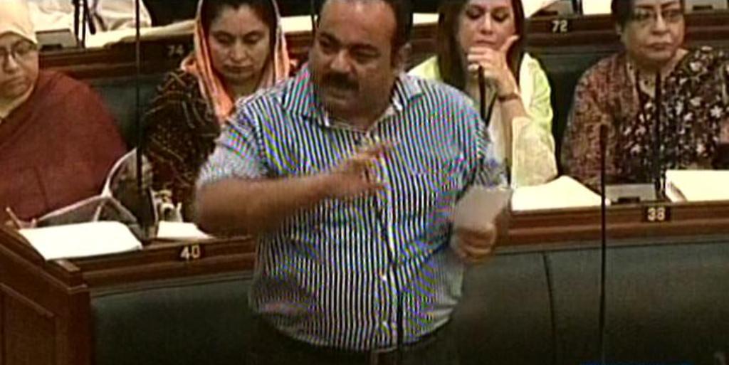 express news screengrab of mqm mpa khawaja izharul hassan addressing the sindh assembly