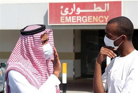 file phot of men wearing surgical masks as a precautionary measure against the novel coronavirus photo reuters file