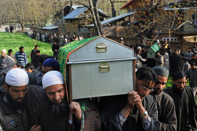 kashmiri villagers carry the coffins of slain village council head ghulam nabi and his son firdous ahmed in the tral area south of srinagar on april 22 2014 photo afp kashmiri villagers carry the coffins of slain village council head ghulam nabi and his son firdous ahmed in the tral area south of srinagar on april 22 2014 photo afp