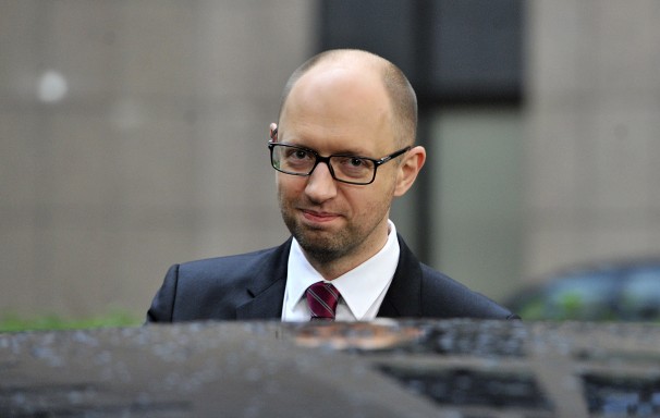 yatsenyuk will be one of dozens of world leaders attending a ceremony on sunday that will confer sainthood on popes john paul ii and john xxiii photo afp