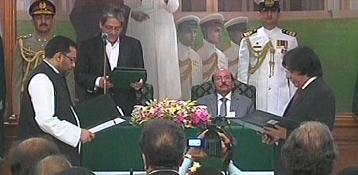 express news screengrab showing mqm 039 s rauf siddiqui taking oath as minister