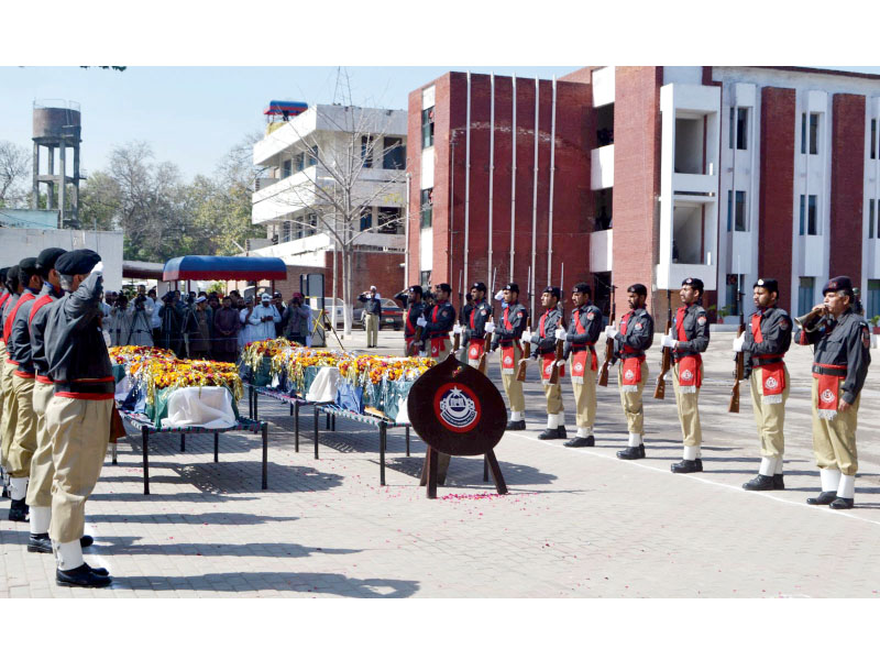 policemen give a final salute to their fallen colleagues at the police lines photo inp