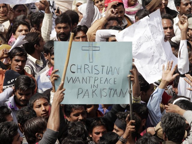 pakistani christians shout slogans during an anti taliban protest in lahore on march 16 2015 photo afp