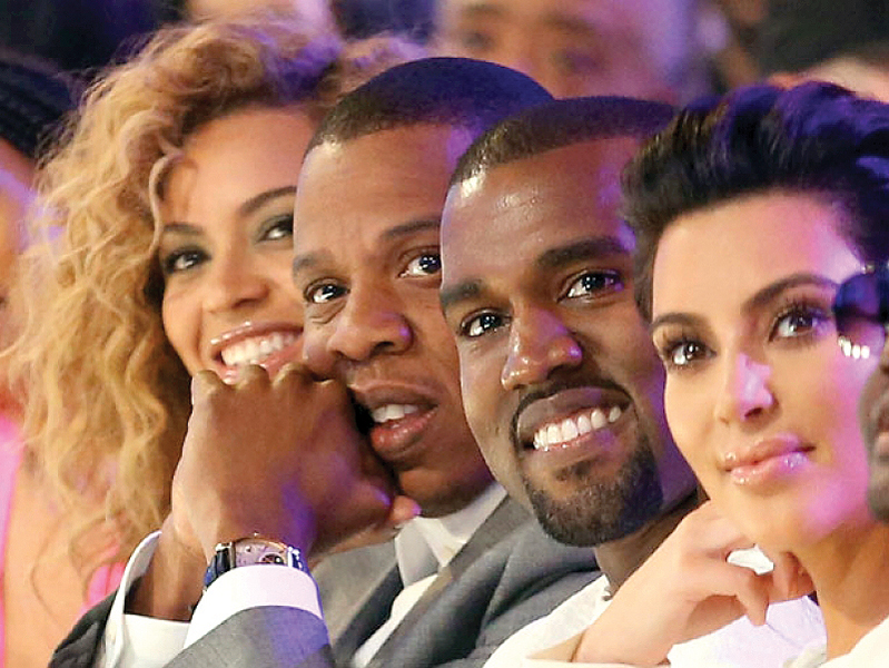 jay z will be throwing kanye a lavish bachelor party to make up for not being able to attend his wedding photo file